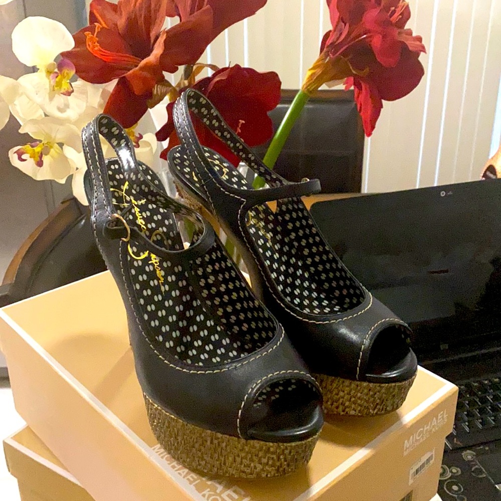 Black platform heels with wicked platform base